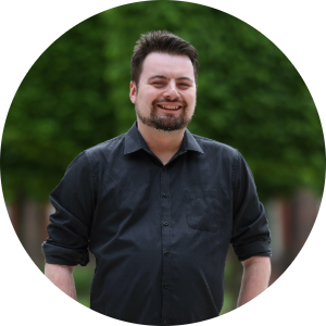 Headshot of Josh James-Farrell taken on the University of Liverpool campus