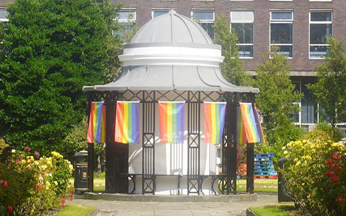 The rotunda in Abercromby Square adorned with colourful LGBT rainbow pride flags