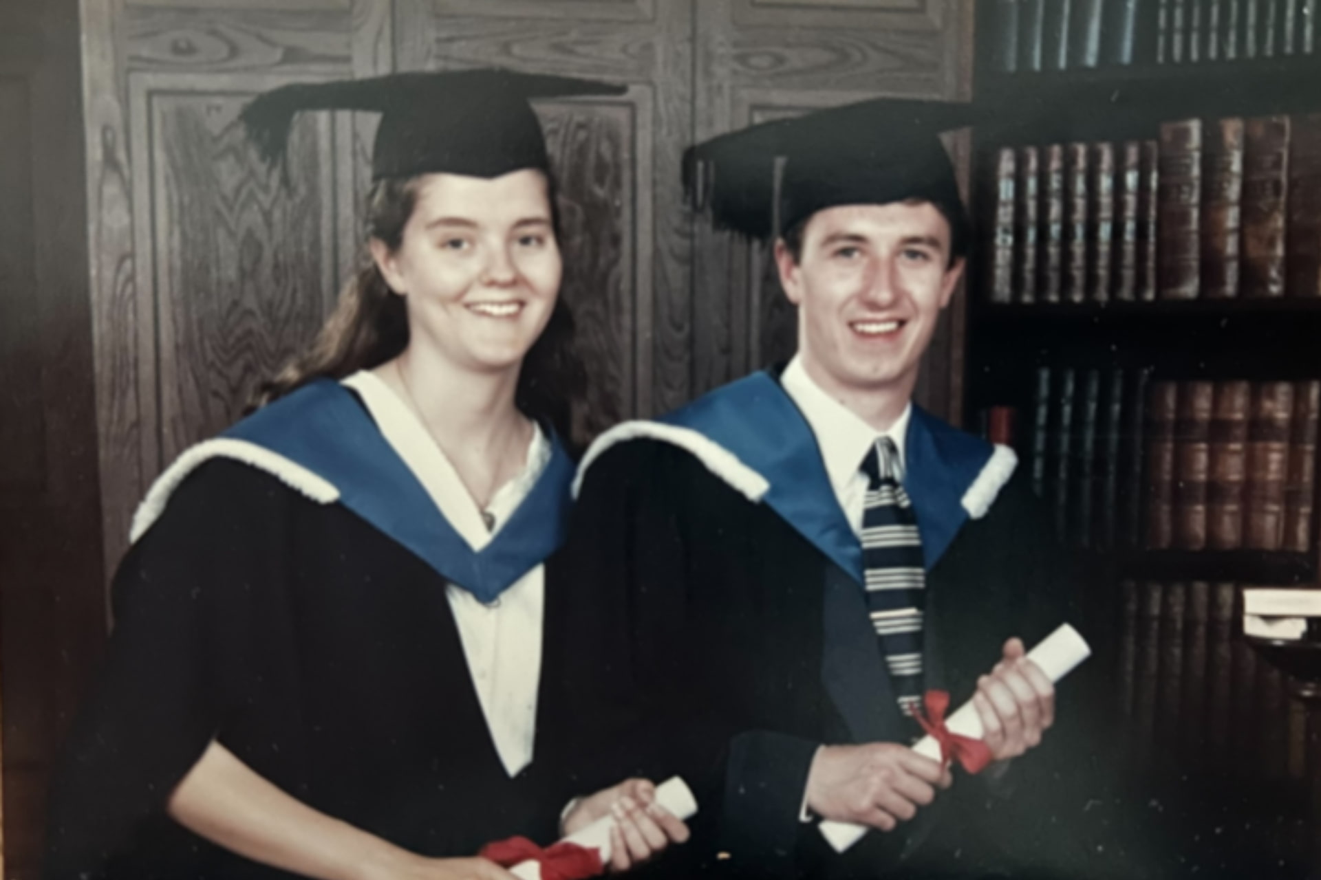Two students on their graduation getting their formal photographs