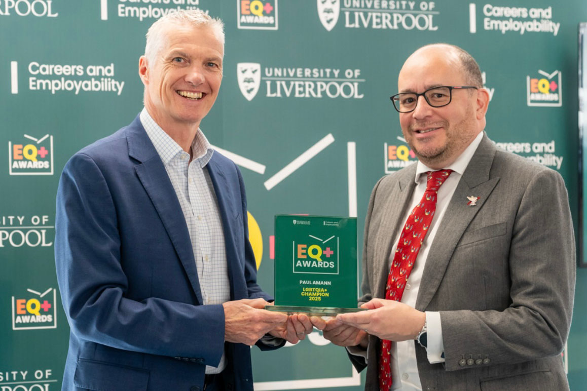 person accepting an award from another person