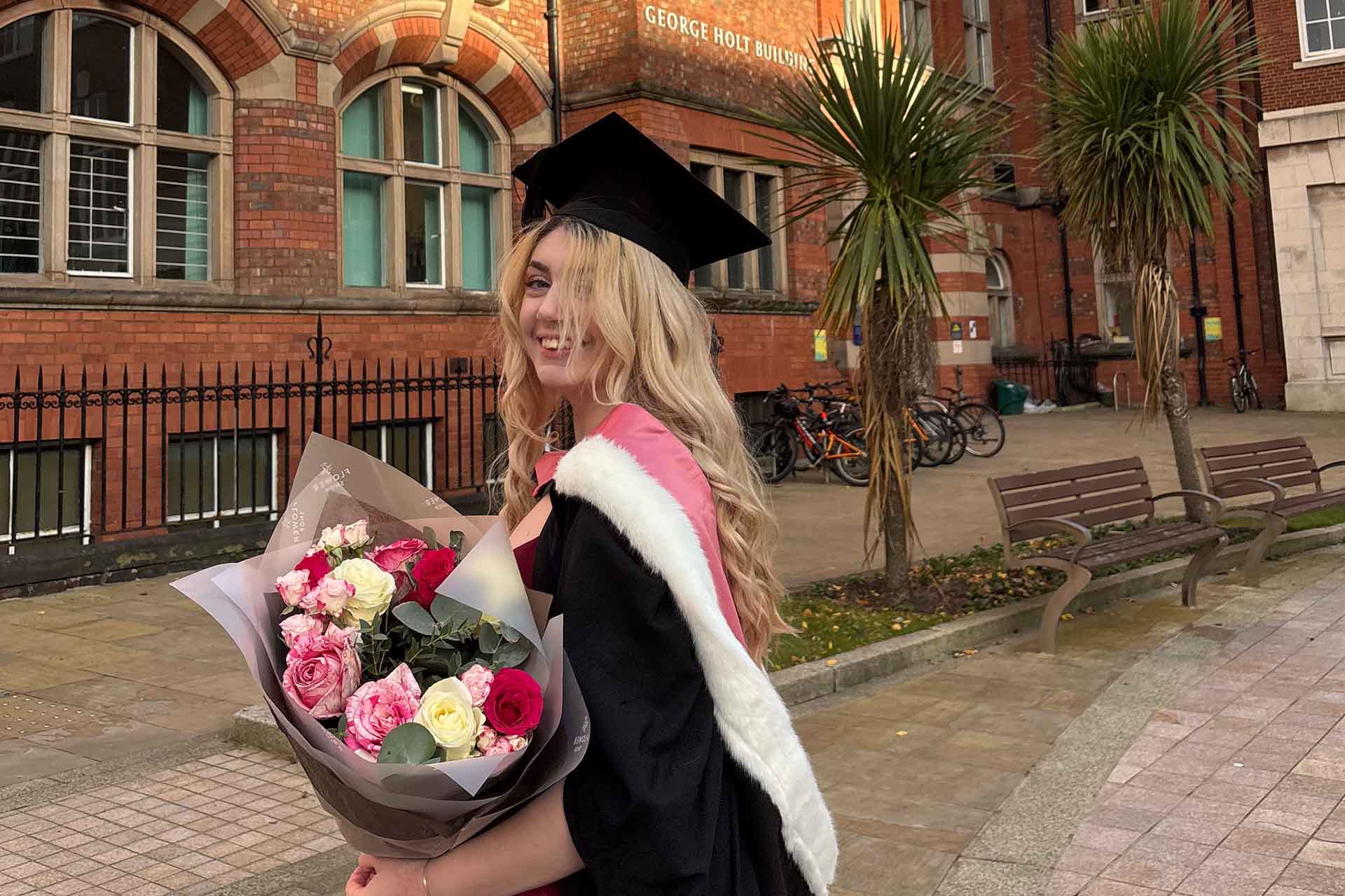 graduate in academic dress
