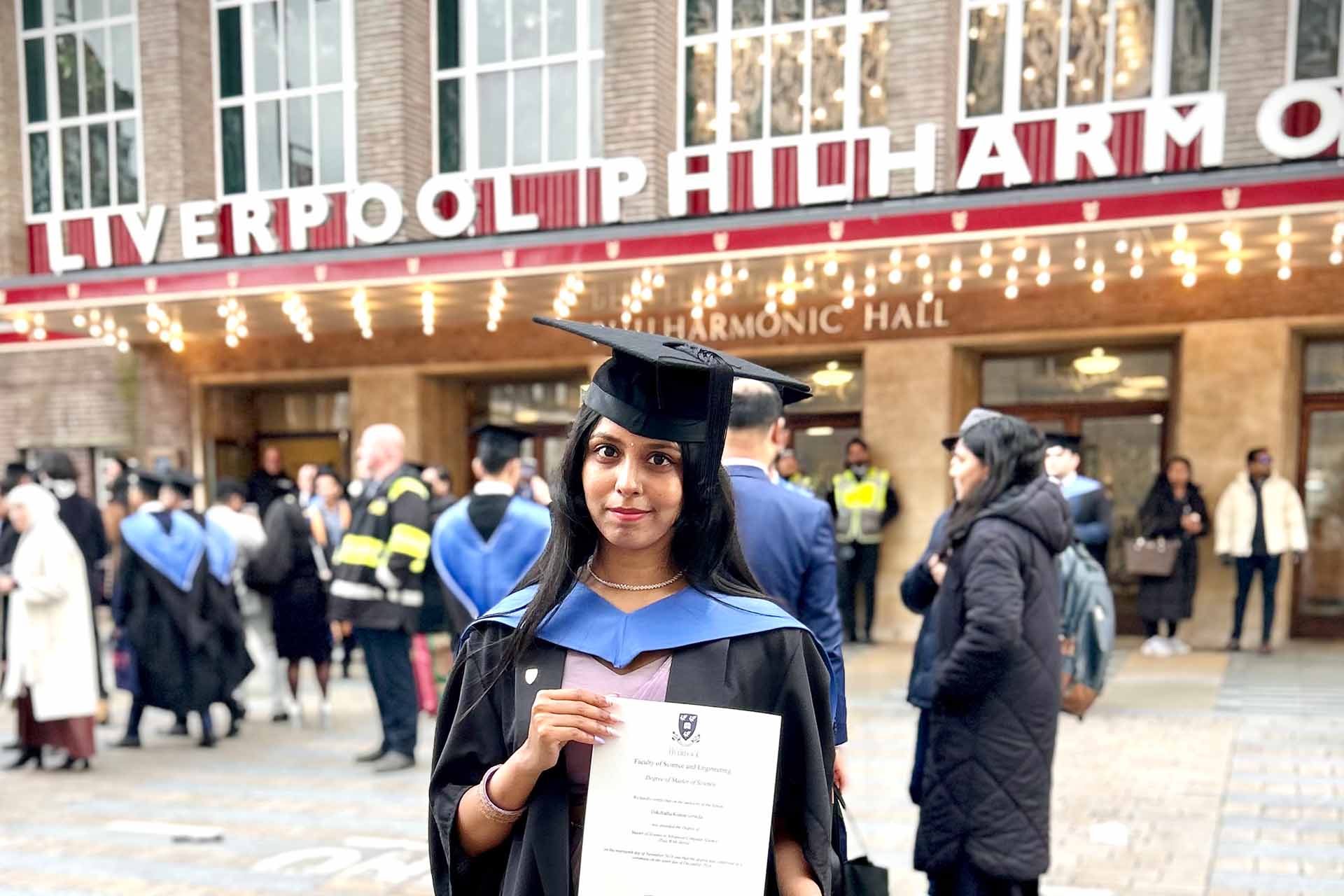graduate in academic dress