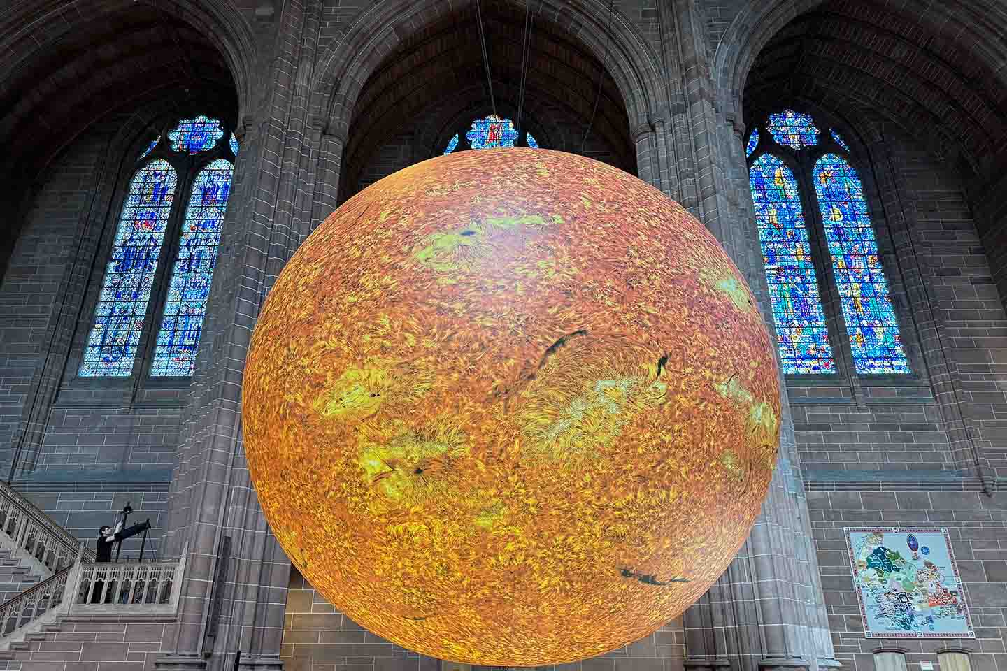 Giant sun sculpture in a cathedral