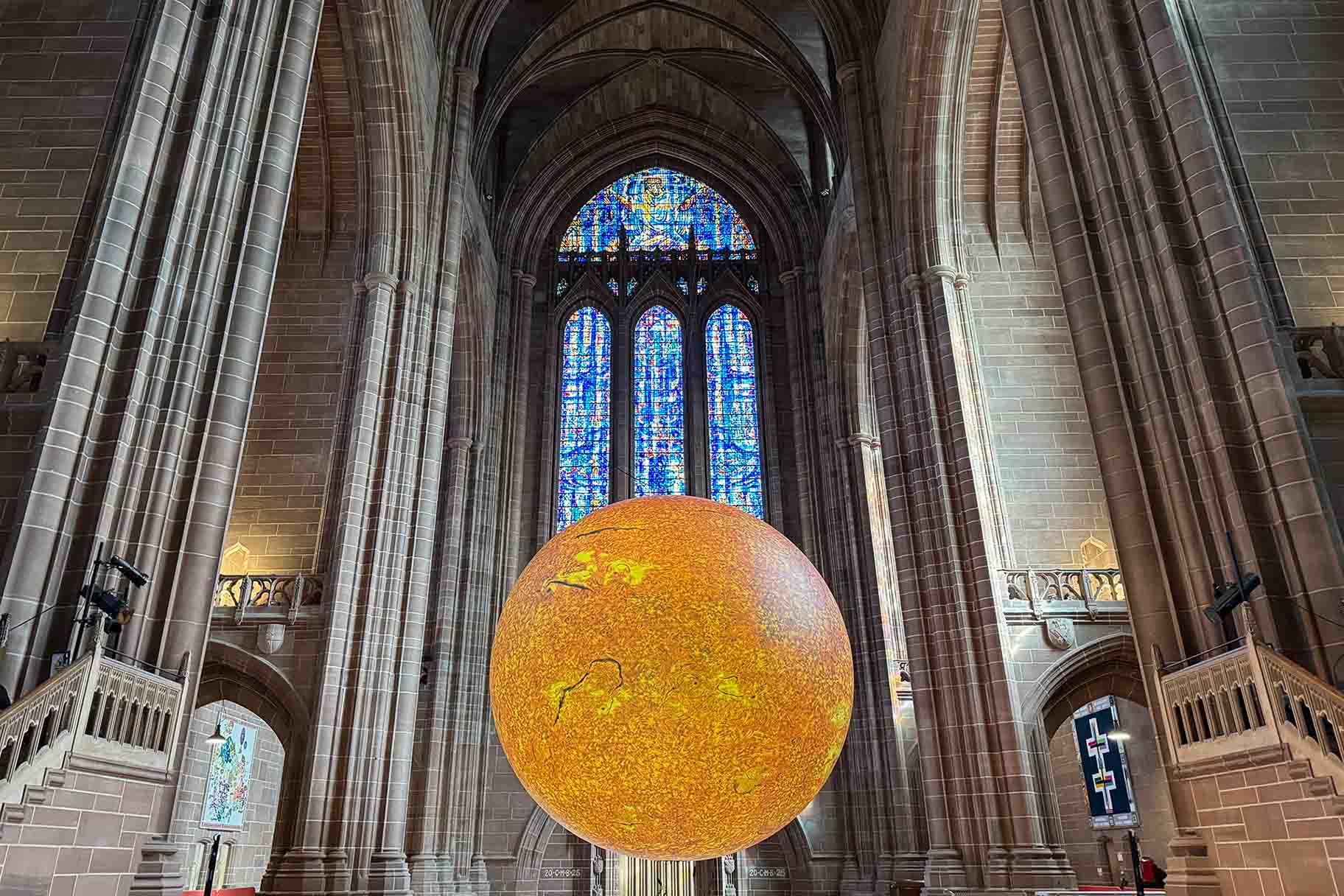 Giant sun sculpture in a cathedral