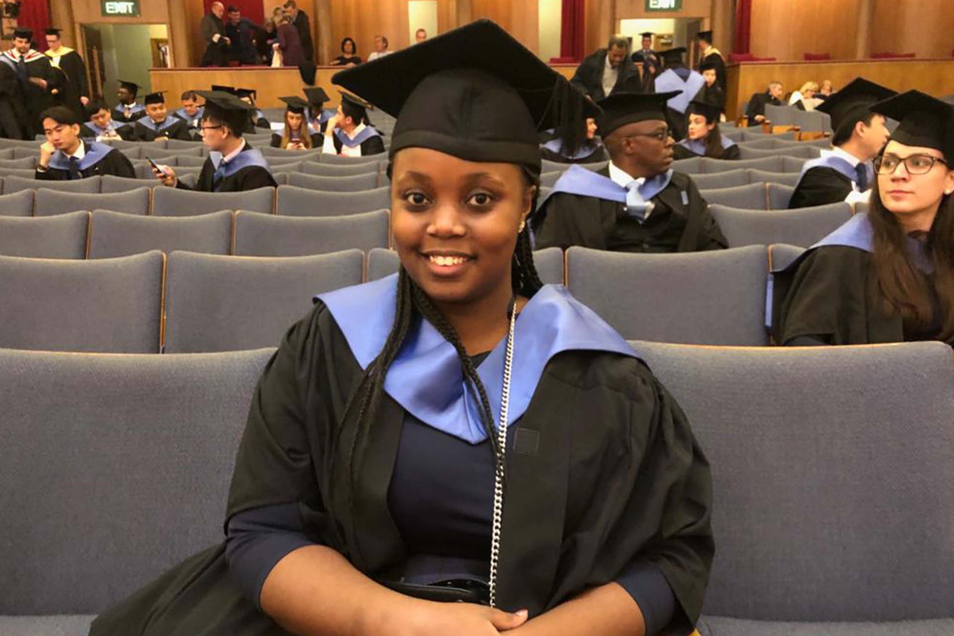 graduate in academic dress