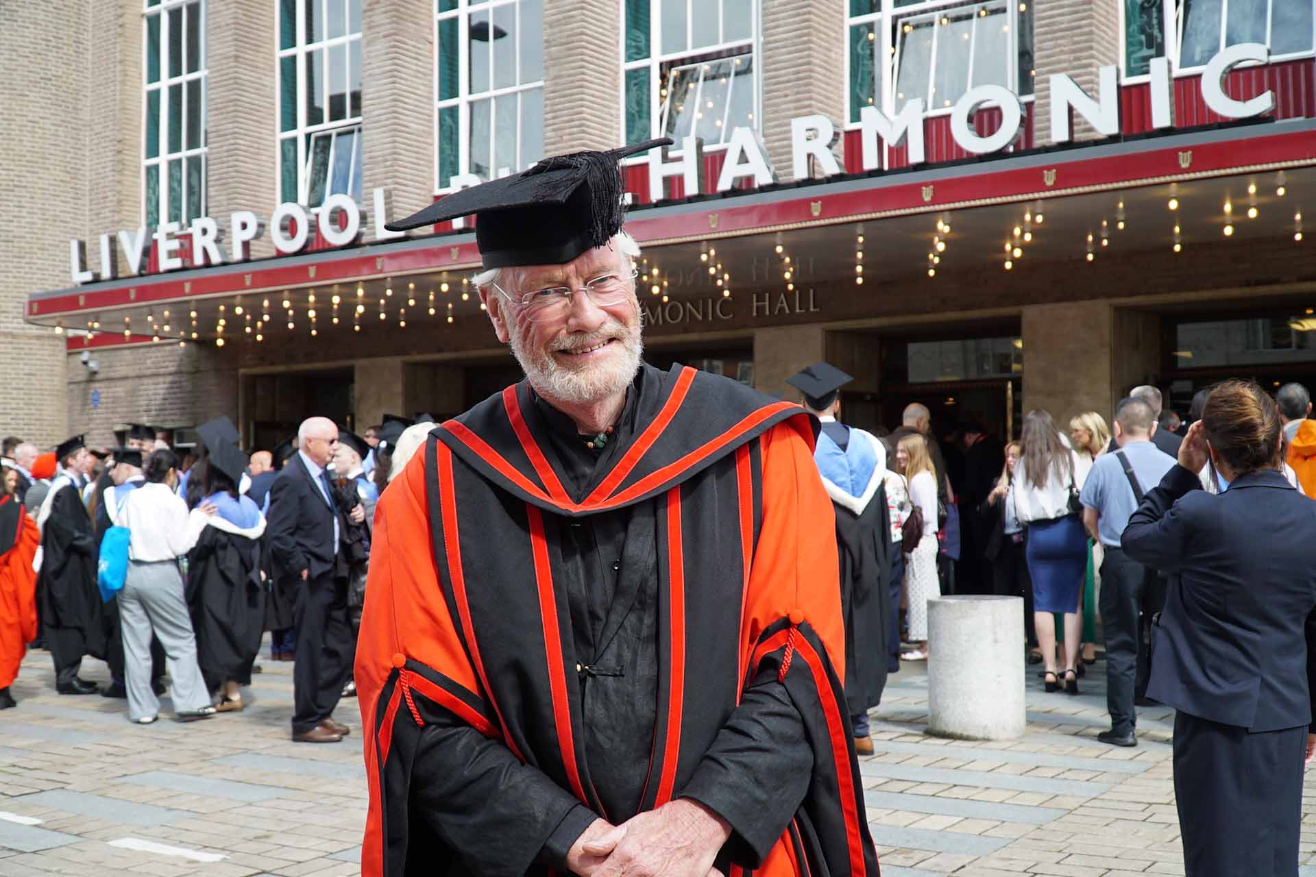 graduate in academic dress