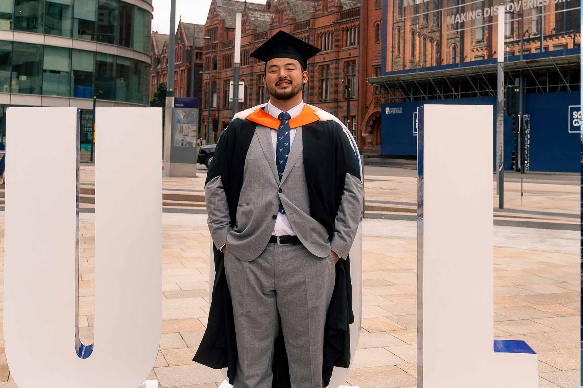 graduate in academic dress