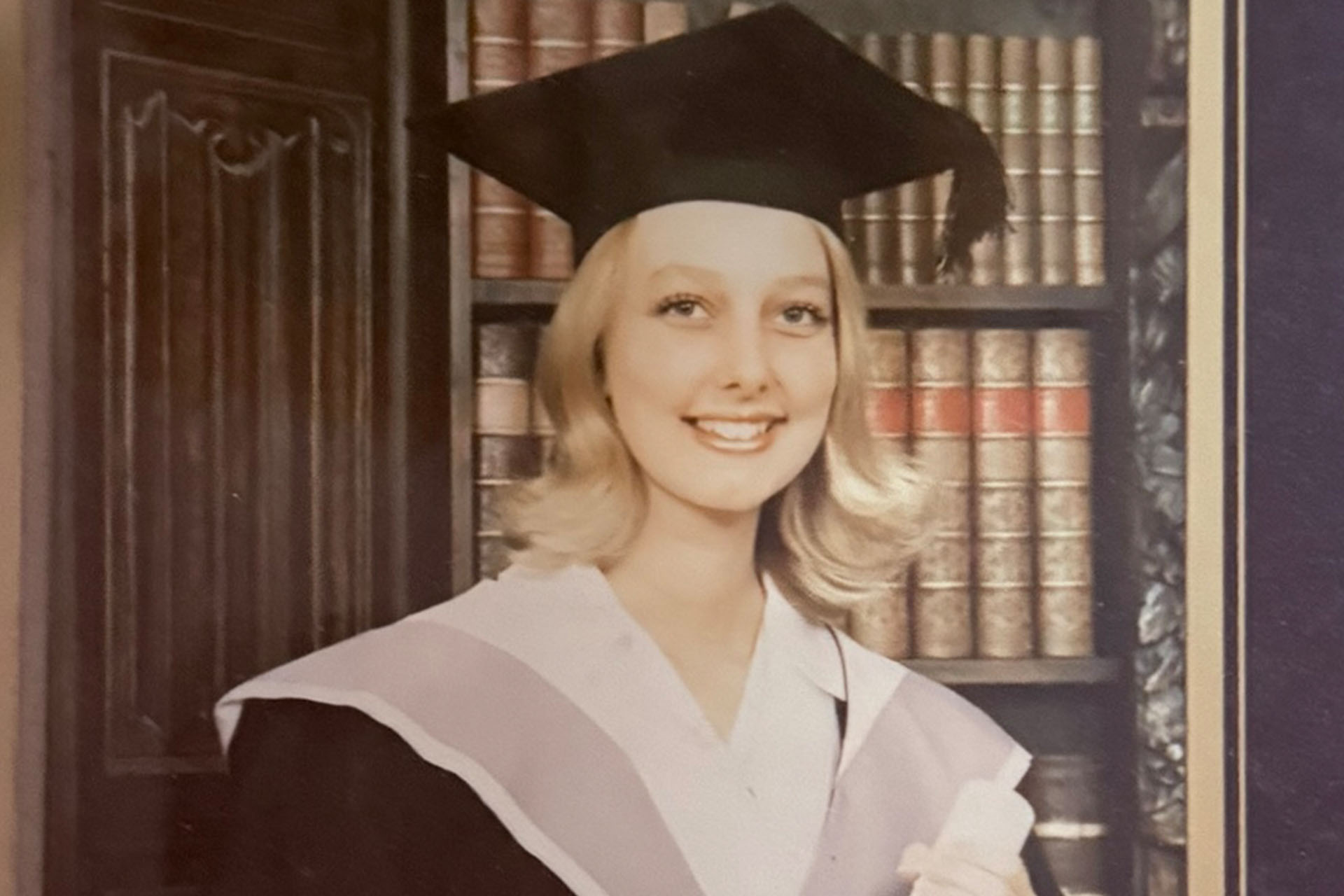 graduate in academic dress