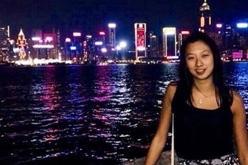 Image of person with a skyline in the background