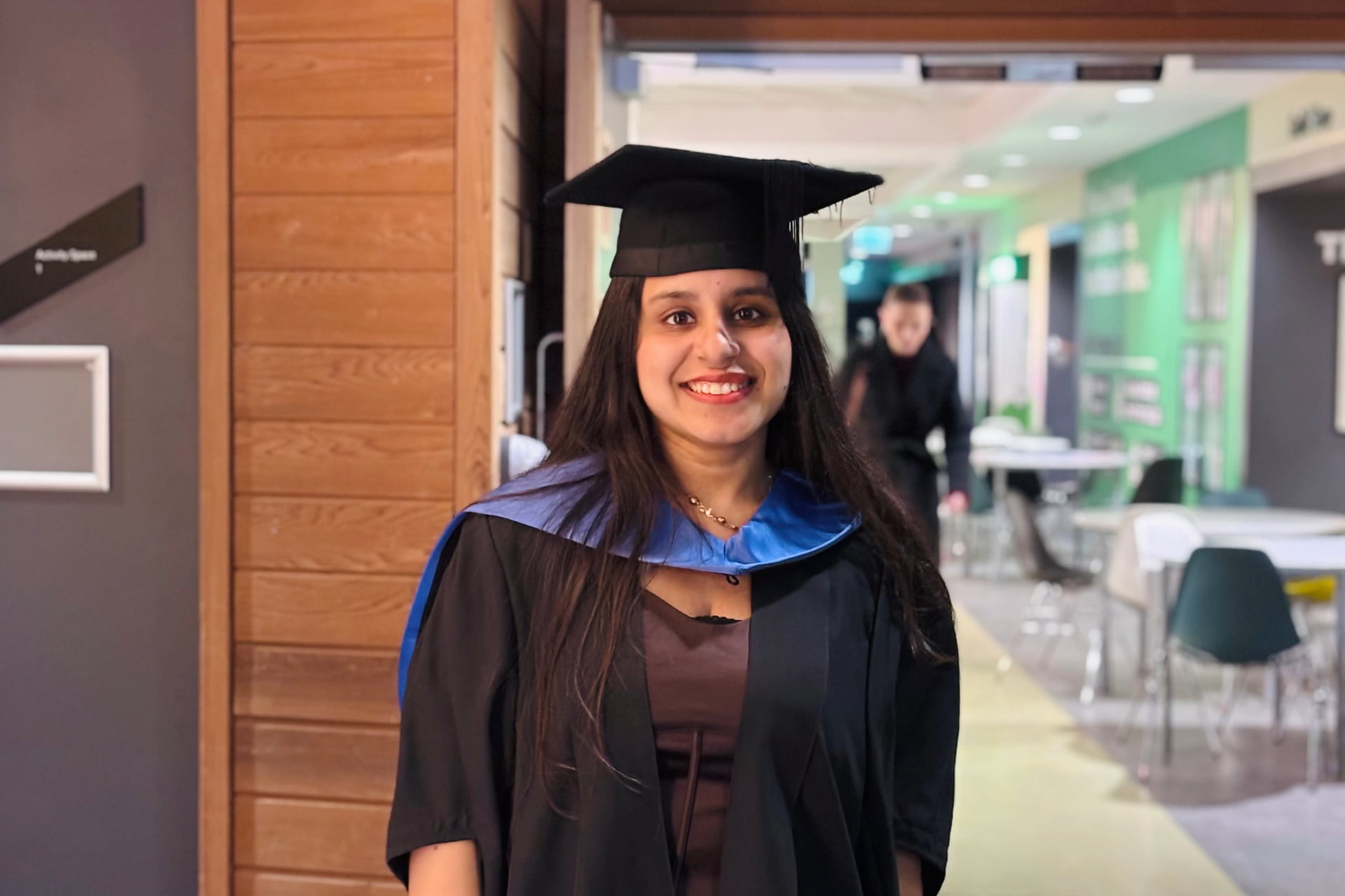 Image of a person on their graduation day