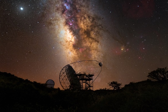 Roque de los Muchachos Observatory with starry skies in the background