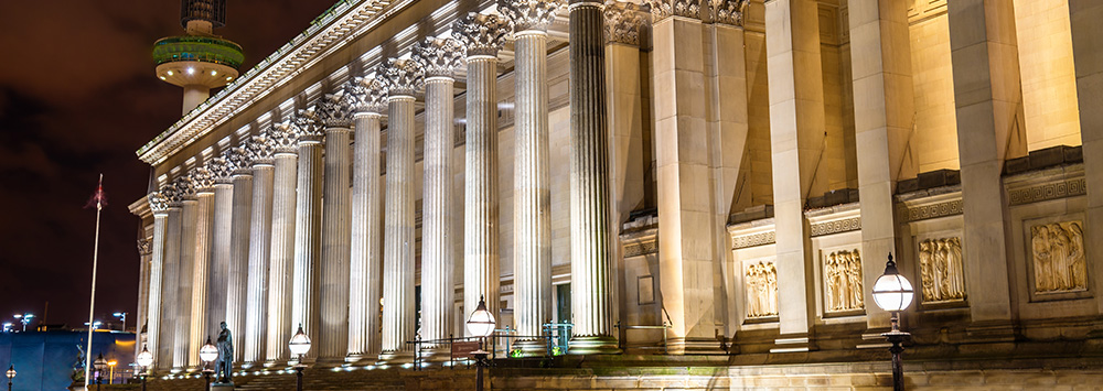 External view at night of the historic building St George's Hall in Liverpool