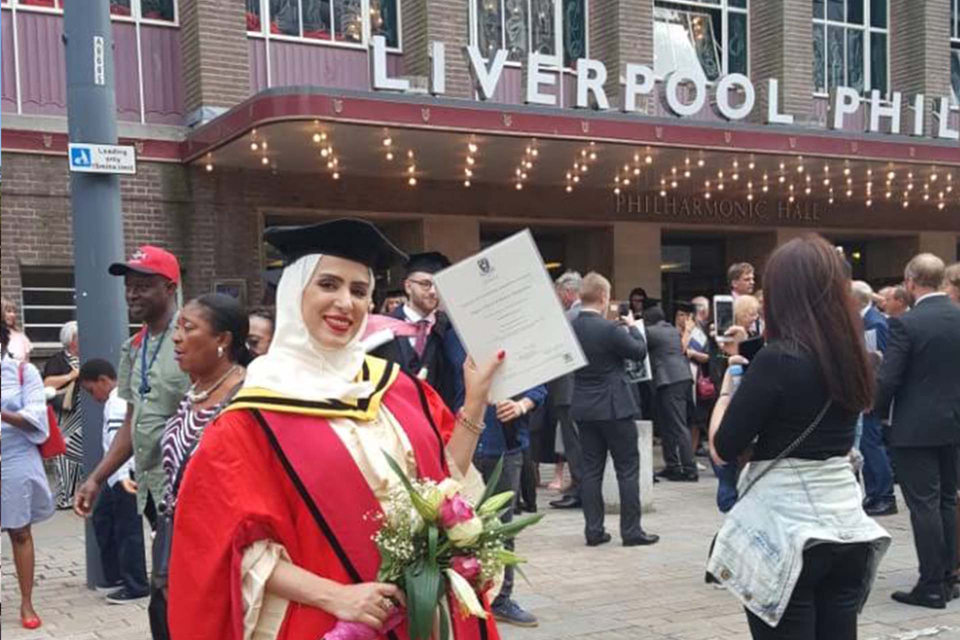 graduate in academic dress