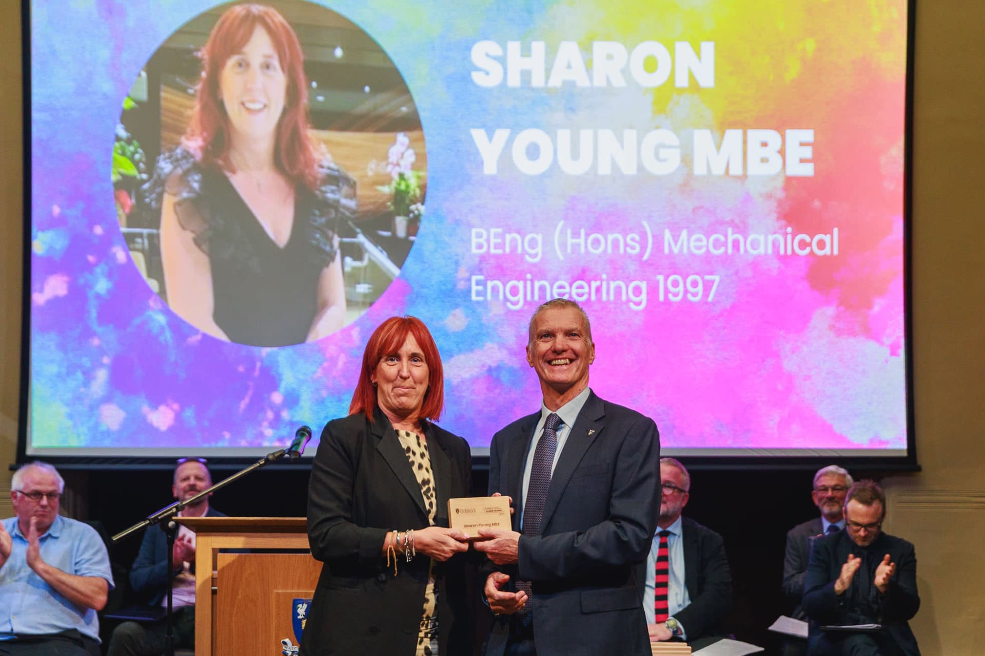 Image of person accepting an award
