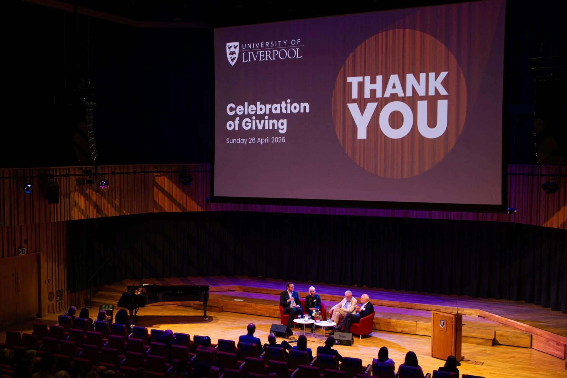 Image of a talk in an Auditorium