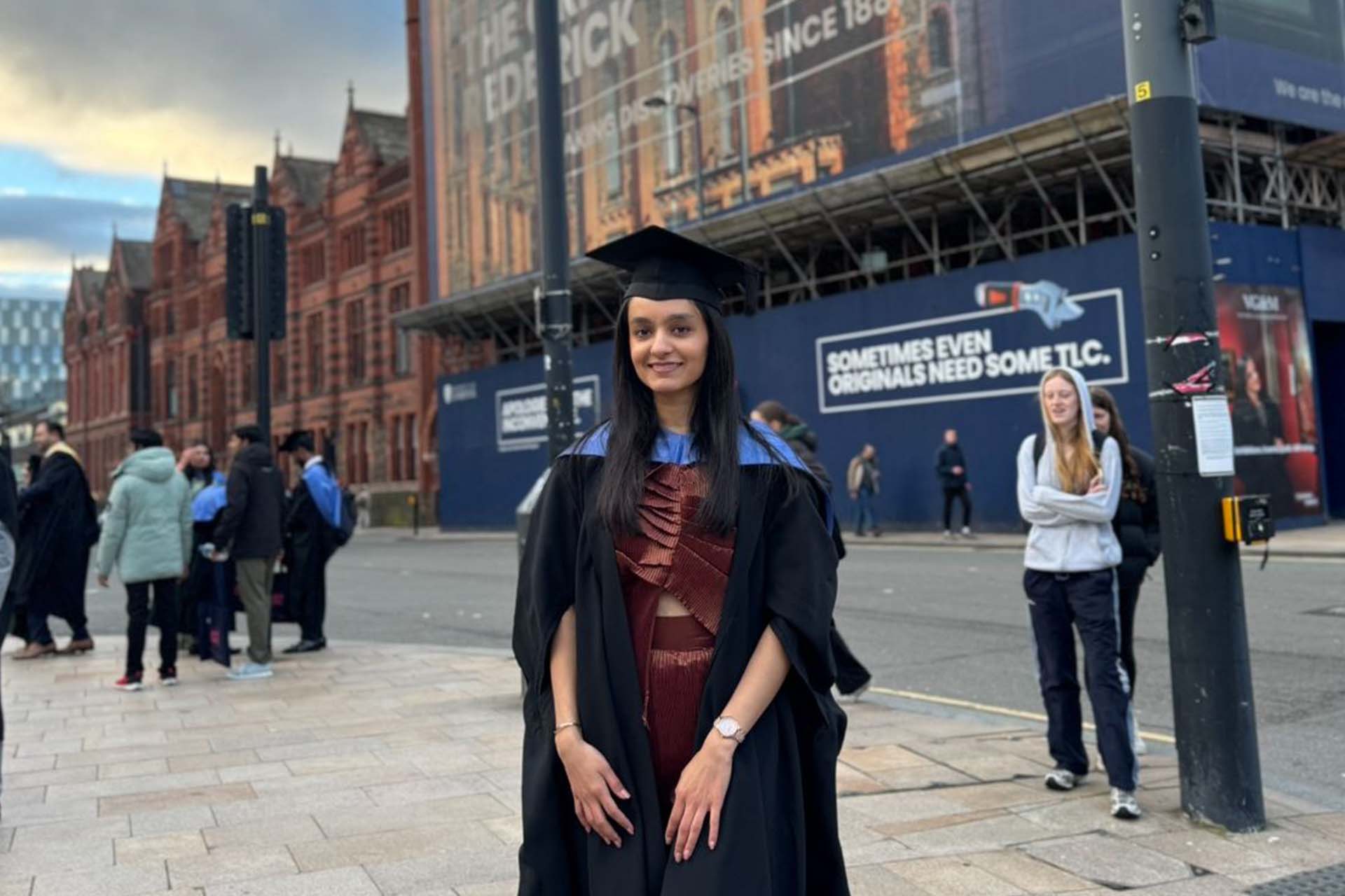 graduate in academic dress