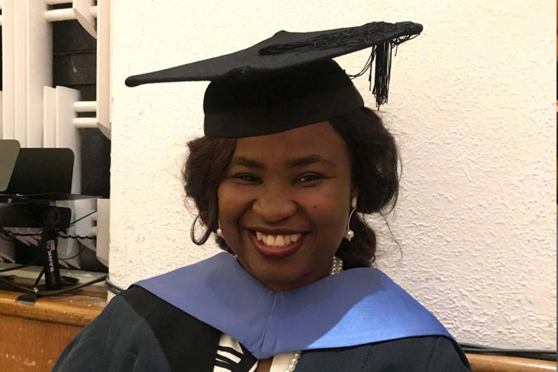 graduate in academic dress