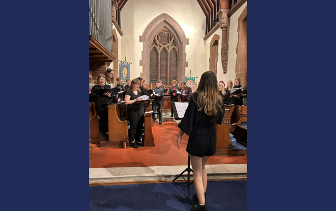 Leahurst Vet School choir performing in a church